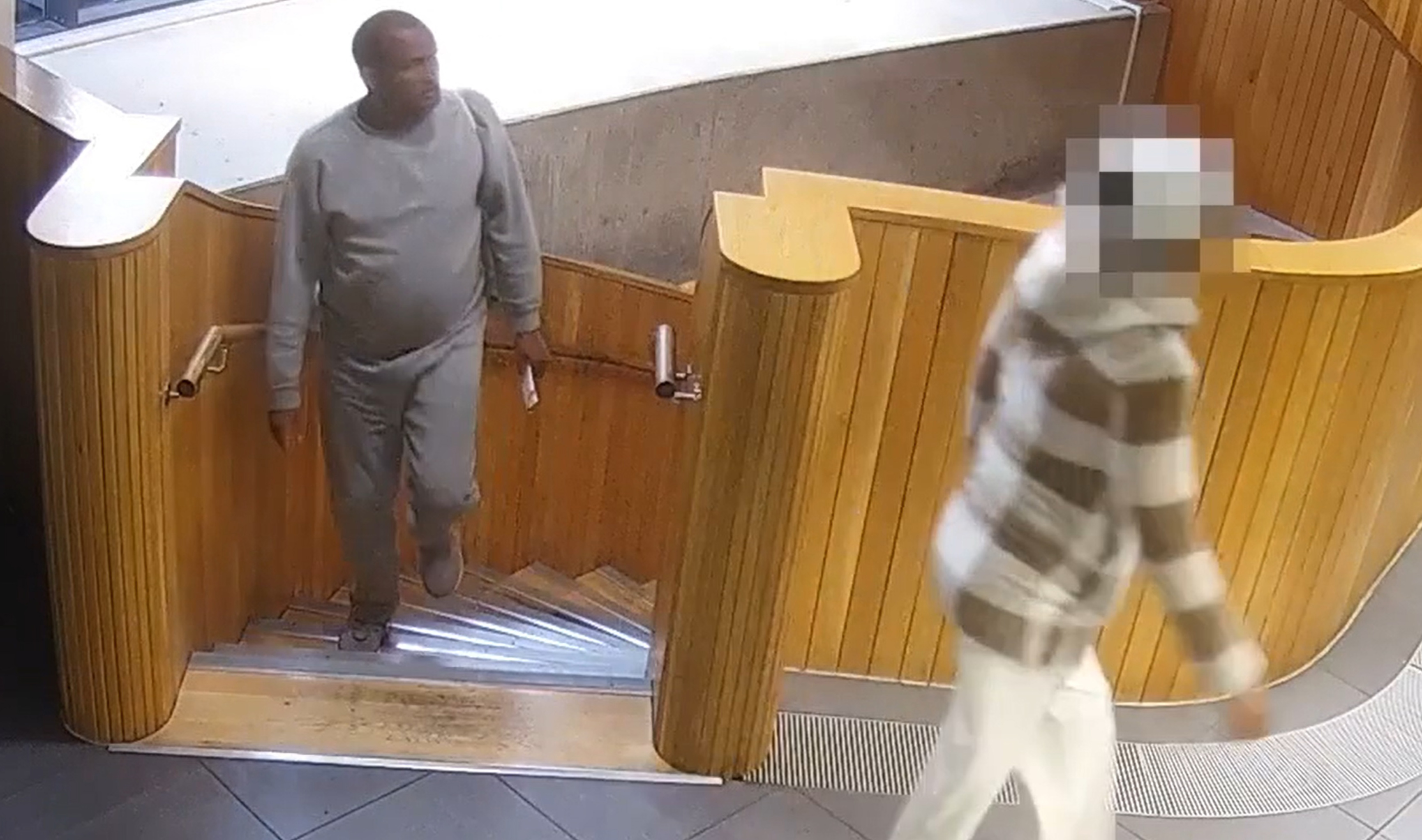 CCTV image of Hadush Gerberslasie Kebatu walking down stairs.