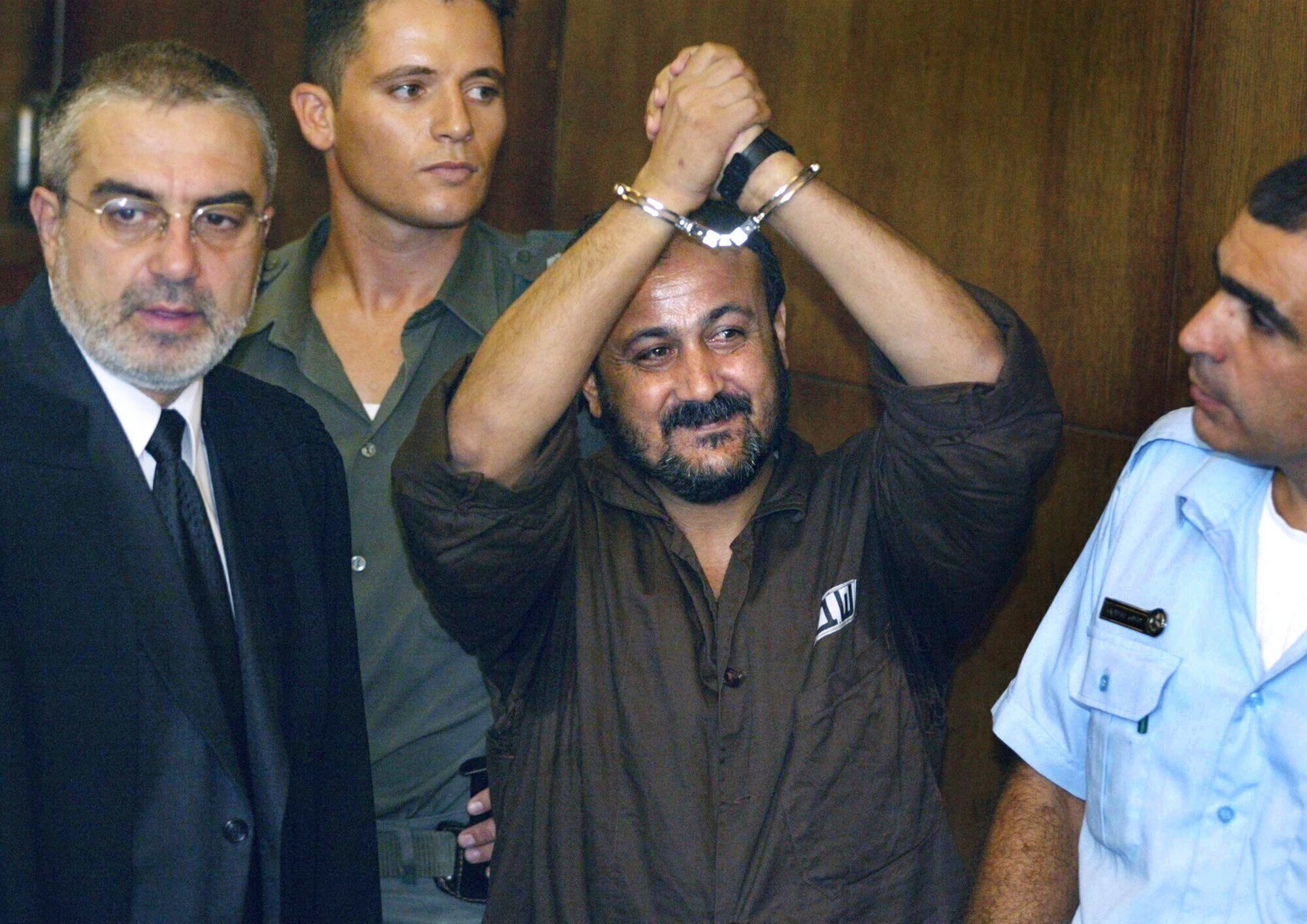 Marwan Barghouti, centre, on the opening day of his trial in Tel Aviv in 2002