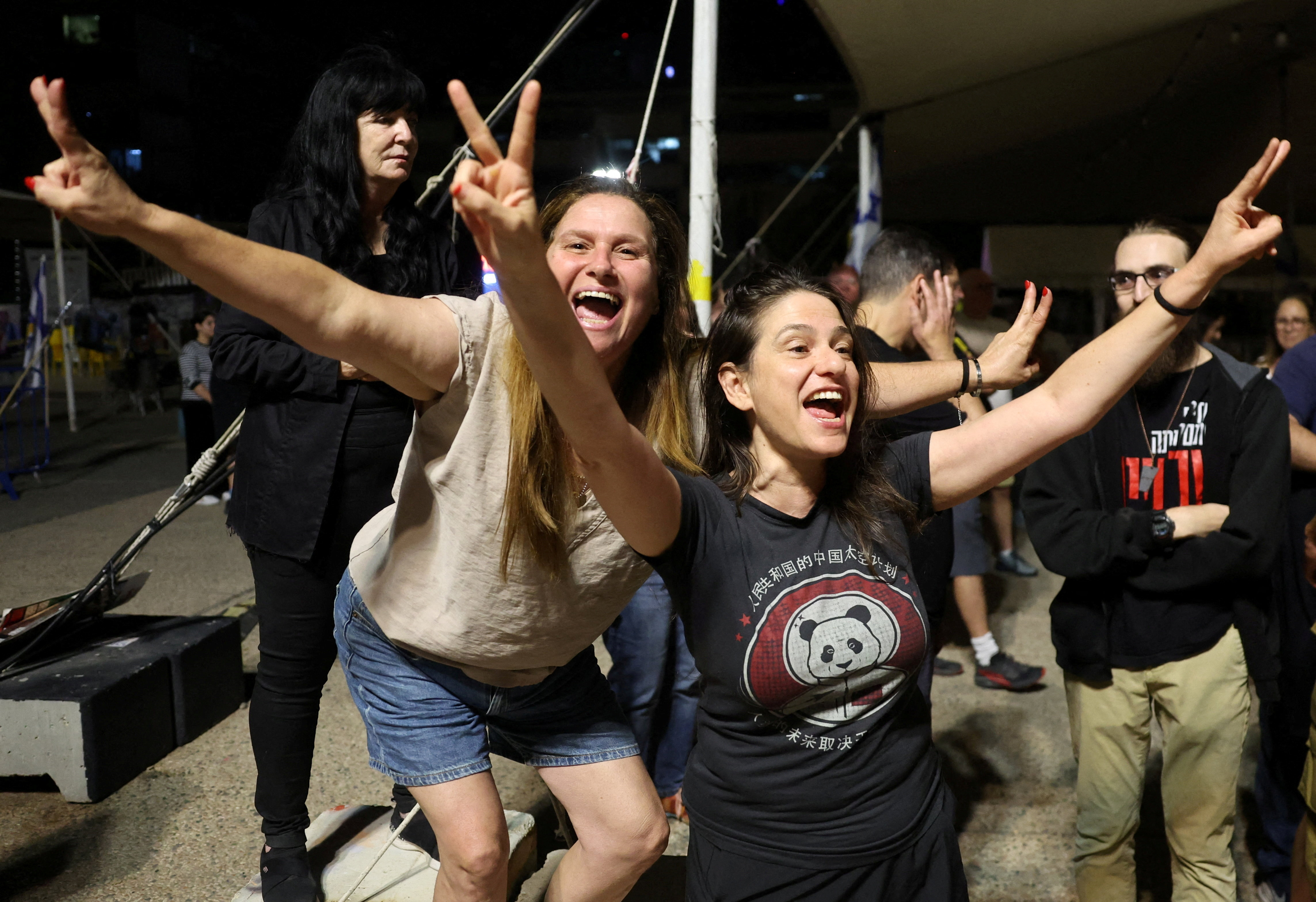 Israelis celebrate in Hostage Square, Tel Aviv, following the announcement