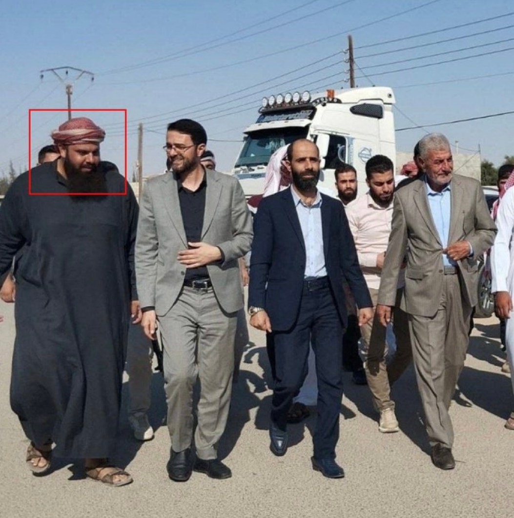 Khaled Al-Masoud Al-Badri (red mark) with local Syrian officials northeast of Damascus.