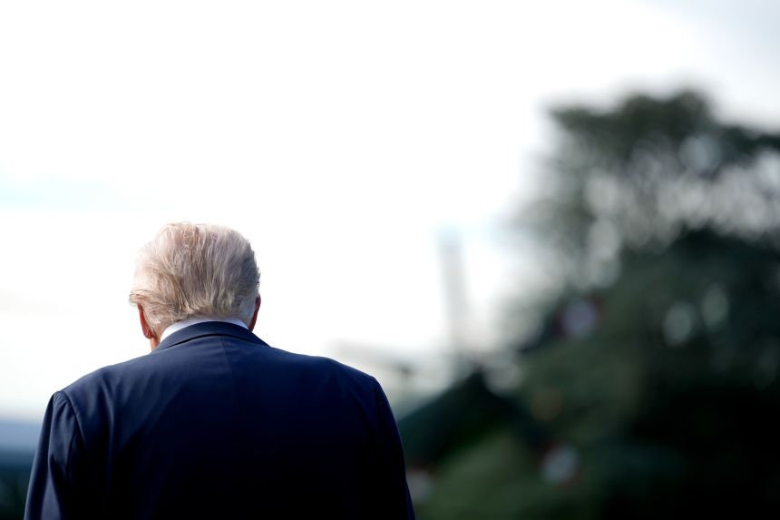 President Donald Trump walks on the South Lawn of the White House before boarding Marine One on September 26, 2025.