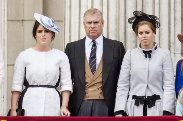 Princess Eugenie and Princess Beatrice with Prince Andrew, Duke of York during the annual Trooping The Colour ceremony at Buckingham Palace on June 15, 2013 in London, England.