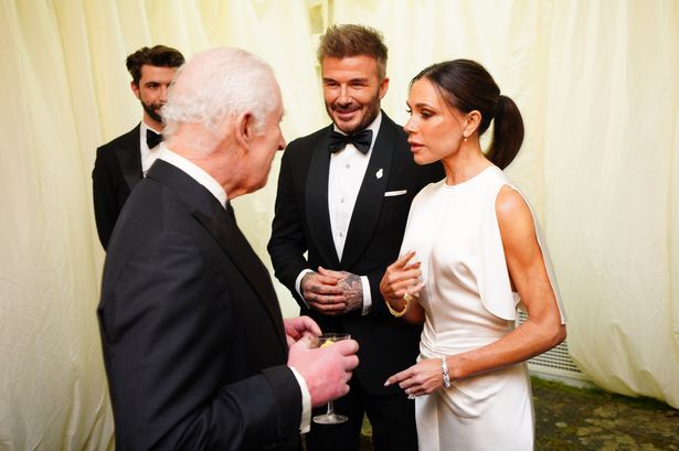 King Charles talks to David and Victoria Beckham