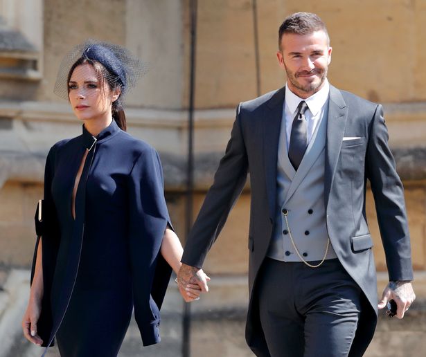 Victoria Beckham and David Beckham attend the wedding of Prince Harry to Ms Meghan Markle at St George's Chapel, Windsor Castle on May 19, 2018 in Windsor, England