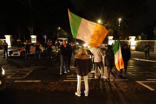 20/10/'25   Gardai form a cordon across the entrance to Citywest Hotel, Saggart tonight as a small group of protesters remonstrate after an earlier alleged incident .....Picture Colin Keegan, Collins, Dublin.