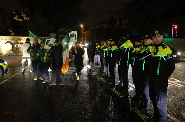 20/10/'25   Gardai form a cordon across the entrance to Citywest Hotel, Saggart tonight as a small group of protesters remonstrate after an earlier alleged incident .....Picture Colin Keegan, Collins, Dublin.