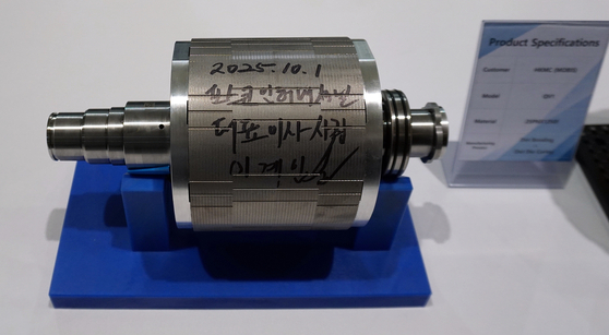 This photo, provided by POSCO International Corp., shows the first drive motor core produced at its Poland plant on Oct. 1, bearing the autograph of the company's President and CEO Lee Kye-in. [YONHAP]