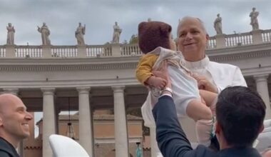 Pope Leo blesses a Taiwanese baby in Vatican City