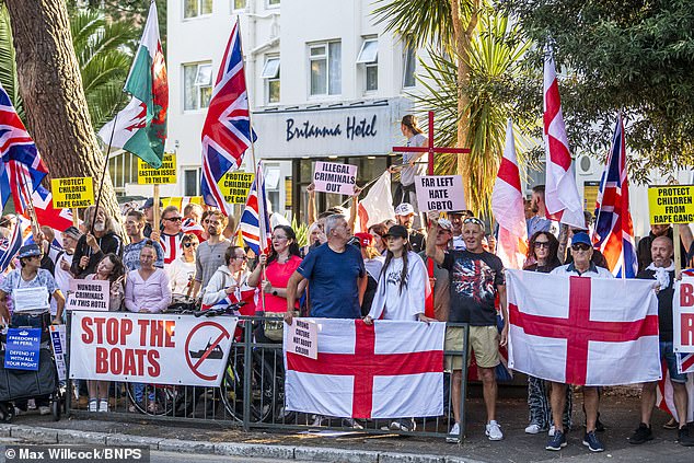 Residents gathered outside the Britannia Hotel in Bournemouth in August this year with signs reading 'Illegal criminals out' and 'Stop the boats'