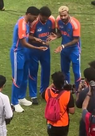 Indian stars Hardik Pandya, Arshdeep Singh and Harshit Rana posed for photos without the trophy