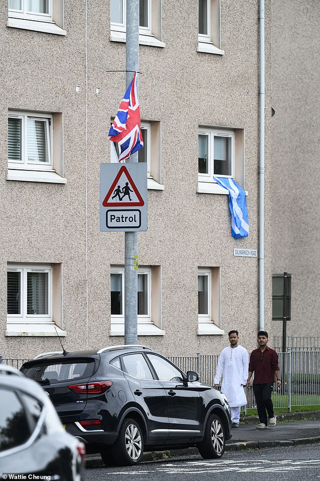 Saltires and Union Jacks were seen hung from flats and attached to lamp posts in Bridgeton, Glasgow