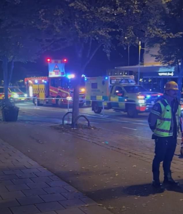 Photos from the scene show police swarming the city centre and cordoning off the street as victims were carried to ambulances