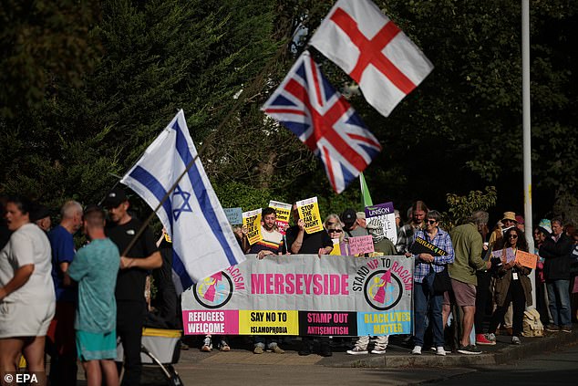 Protesters and counter-protesters outside a different hotel in Hoylake in August