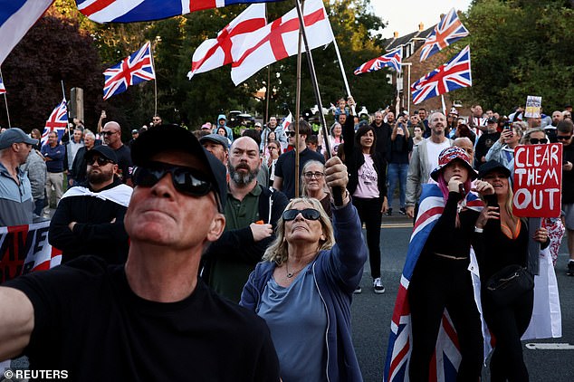 Anti-migrant protesters in Epping last August. The Tory-run Epping Forest District Council in Essex won a temporary injunction on August 19 this year ordering asylum seekers to leave The Bell hotel