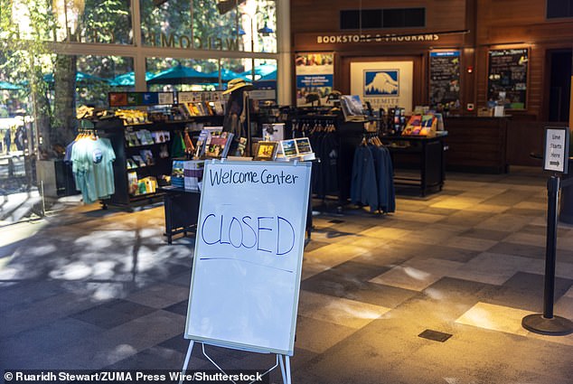 A sign showing that the welcome center at Yosemite National Park is closed due to the ongoing federal government shutdown