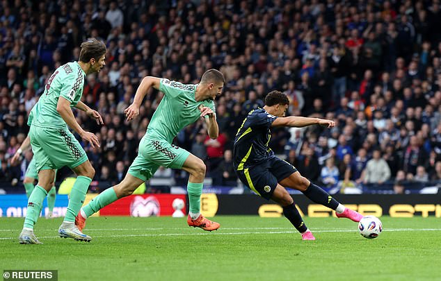 Striker Che Adams gives Scotland an early lead in their World Cup qualifier against Belarus