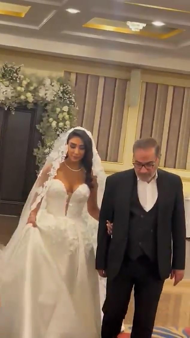 The wedding dress of one of Ayatollah Ali Khamenei's senior advisors has sparked fury in Iran with people accusing the Islamic Republic official of double standards
