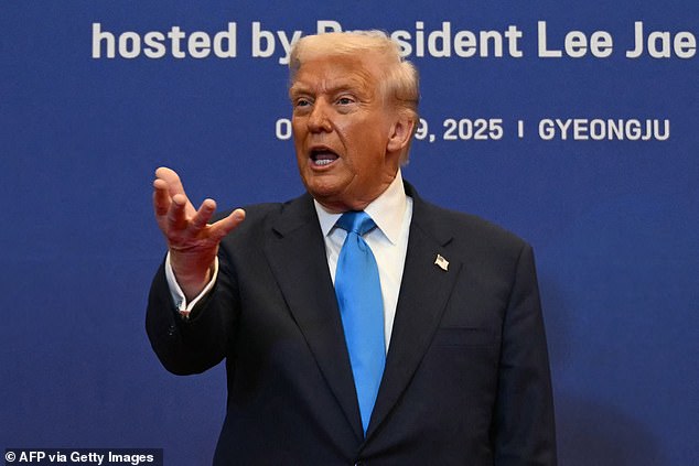 Trump is pictured in South Korea on Wednesday