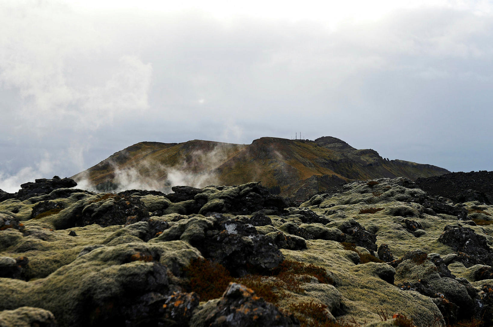 Looking across the lava field toward Mt Þorbjörn, which rises …