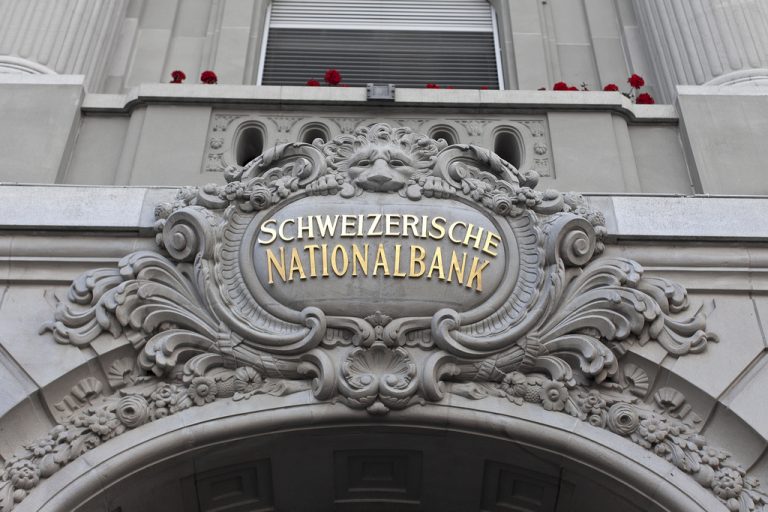 How protected is the Swiss National Bank compared to the US Federal Reserve?