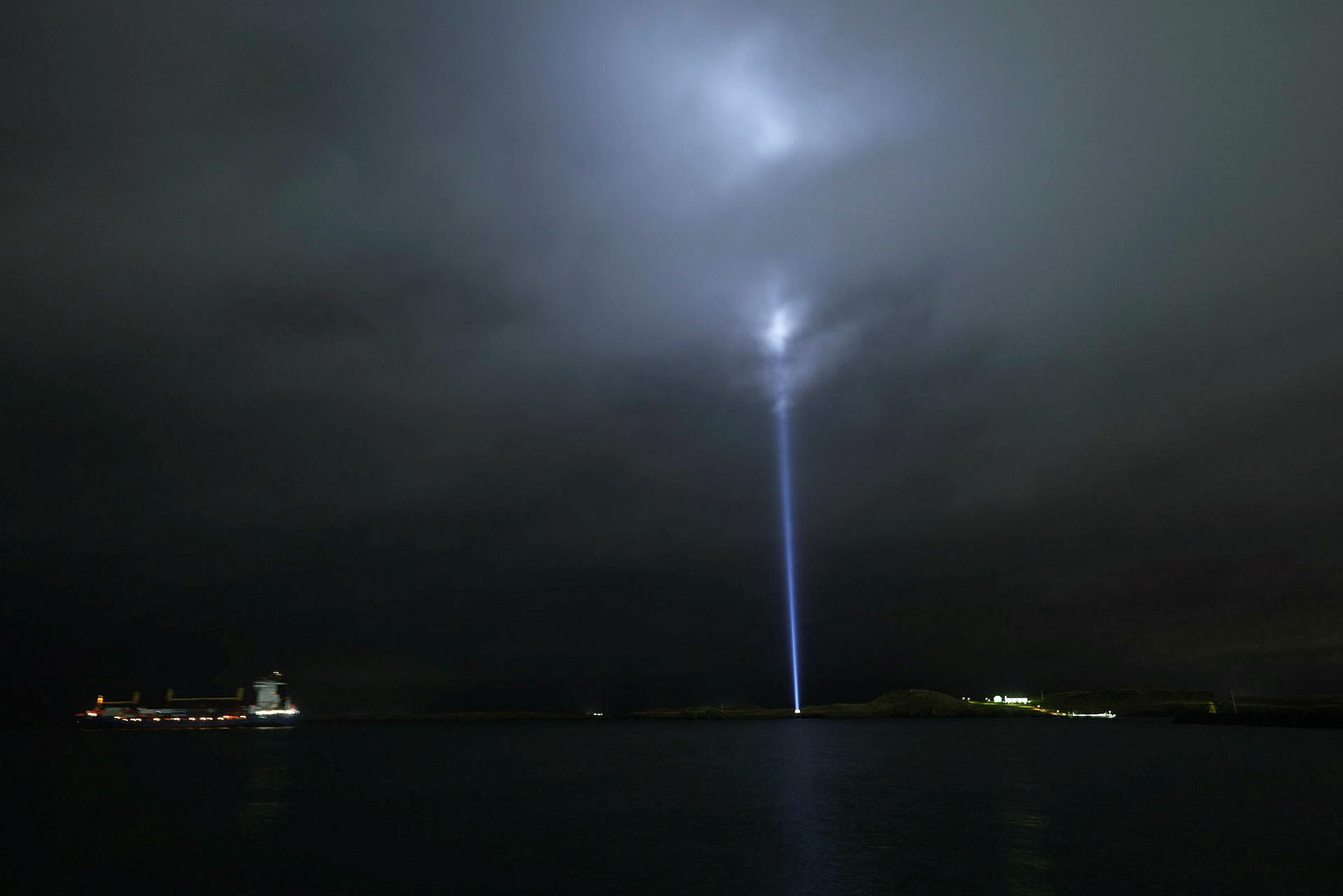 The light of the Imagine Peace Tower on Viðey Island …