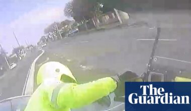 Dashcam video captures postal workers being hit on Australian roads – video | Australia news