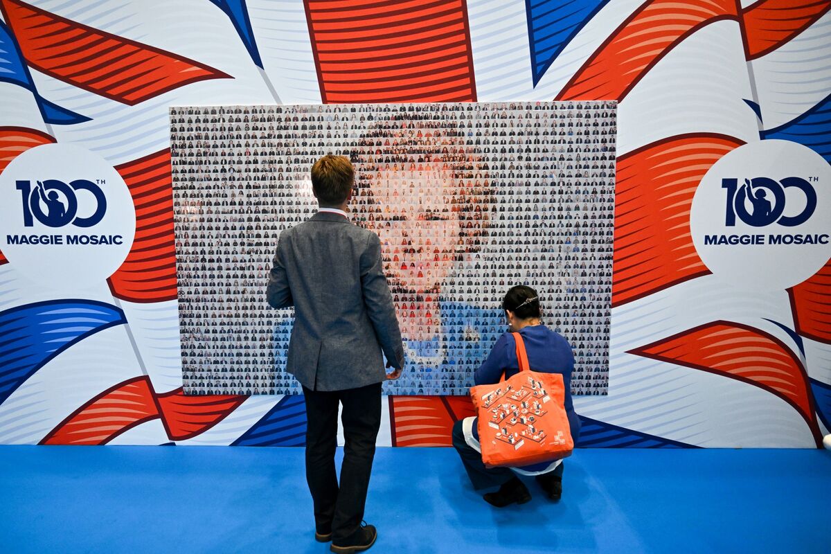 UK Tories Summon Up Thatcher With Tax-Slashing Survival Plan