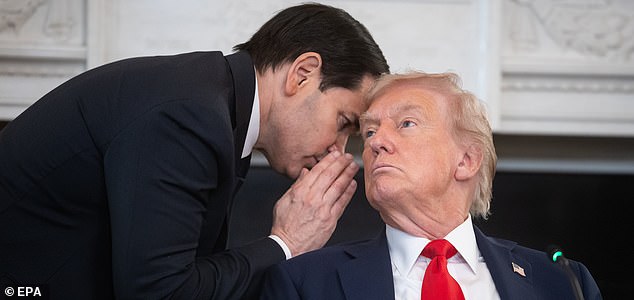 epaselect epa12440529 US Secretary of State Marco Rubio (L) whispers to President Donald Trump (R) during a Roundtable on Antifa in the State Dining Room of the White House in Washington, DC, USA, 08 October 2025. Trump on 22 September designated antifa as a 'domestic terrorist organization' via executive order.  EPA/FRANCIS CHUNG / POOL