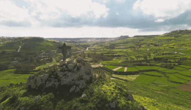 This is not Christo Redentor in Brazil, but Tas-Salvatur in Gozo, Malta, Europe. It dates back to 1901, 30 years earlier than the famous Rio the Janeiro statue. The statue was originally made of wood, but lasted only 3 years, and a stone successor was also replaced in the 1970s.