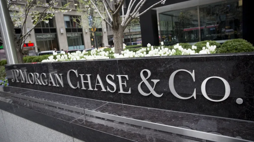 JPMorgan gets Wall Street lift, warns of economy