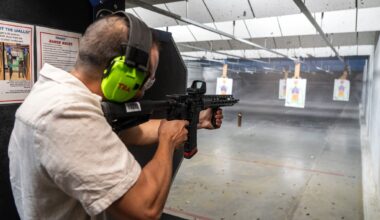 Kristian Frandsen of Denmark shoots an AR-15–style rifle at The Range at Austin as he visits for Formula 1, Friday, Oct. 17, 2025.