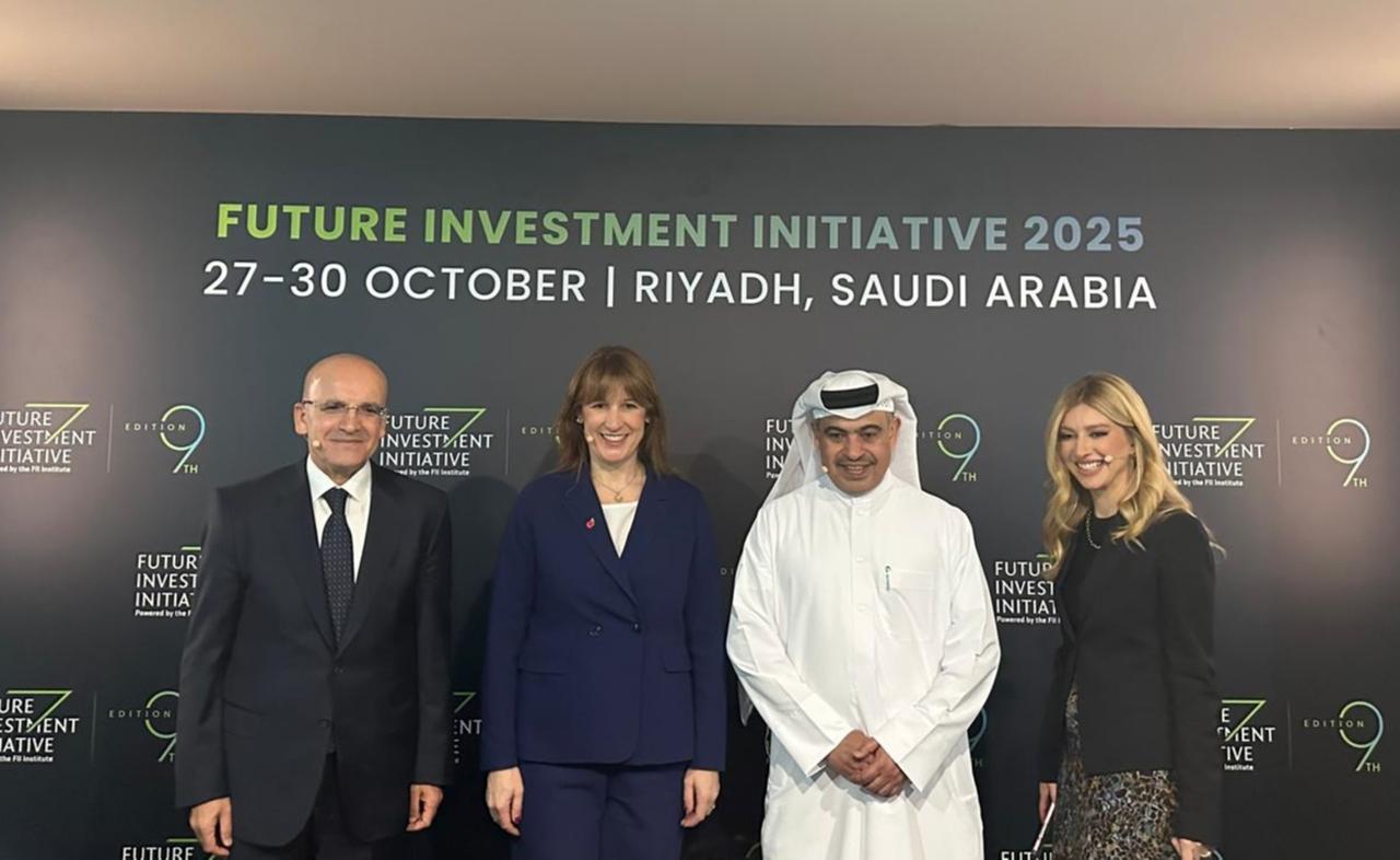 Turkish Treasury and Finance Minister Mehmet Simsek (L) attends a panel at the 9th Future Investment Initiative (FII) held in Riyadh, the capital of Saudi Arabia, October 28, 2025. (AA Photo)
