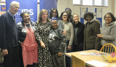 Dame Rachel with some of the family members she met during her visit to the JRS UK Centre