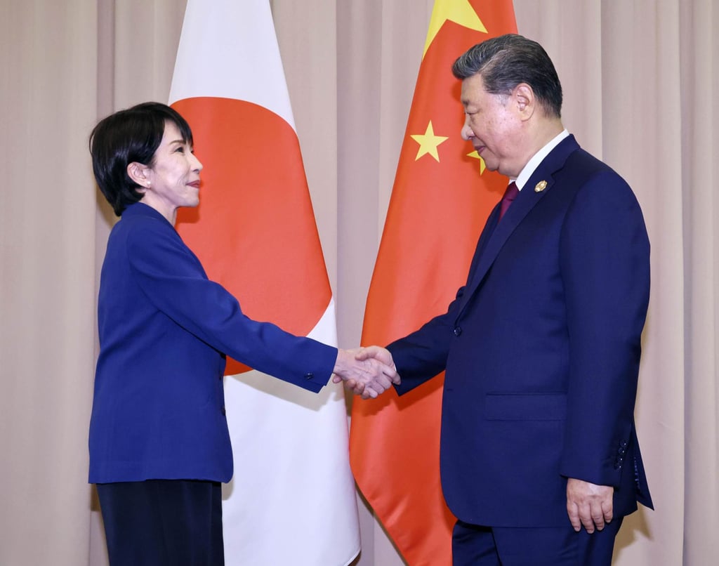 Japanese Prime Minister Sanae Takaichi shakes hands with Chinese President Xi Jinping ahead of their talks in Gyeongju, South Korea, on Friday. Photo: Kyodo