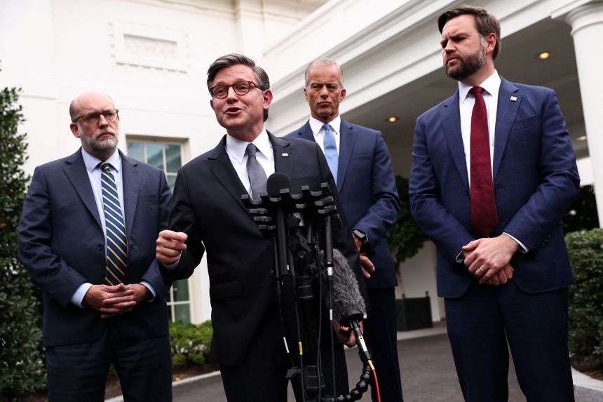 Speaker of the House Mike Johnson speaks to the media next to Vice President JD Vance, Office of Management and Budget Director Russell Vought and Senate Majority Leader John Thune at the White House on Monday, September 29.