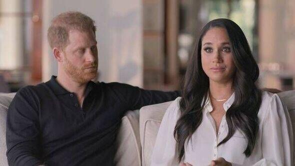 Prince Harry and Meghan Markle influenced by 'coded' photo of Prince George to leave UK