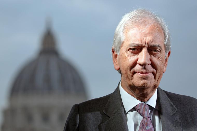 Libero Milone, the Vatican’s ex-auditor general, stands before the dome of St. Peter’s Basilica in Rome.