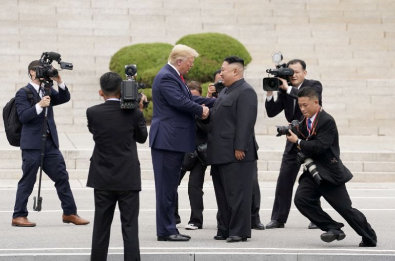 REUTERS PICTURES 40th ANNIVERSARY COLLECTION: U.S. President Donald Trump meets with North Korean leader Kim Jong Un at the demilitarized zone separating the two Koreas, in Panmunjom, South Korea, June 30, 2019. REUTERS/Kevin Lamarque SEARCH "REUTERS PICTURES 40th ANNIVERSARY COLLECTION" FOR THIS PACKAGE