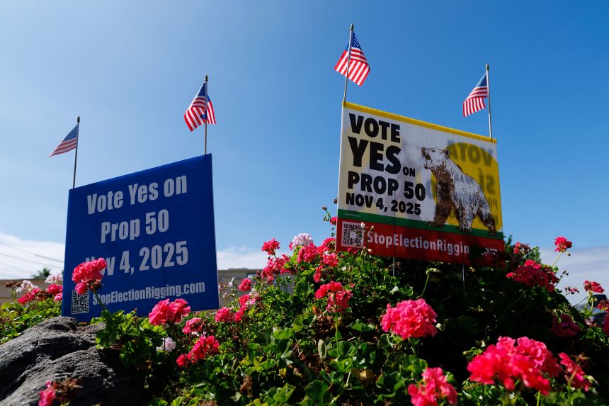 Signs supporting Proposition 50 in a residential neighborhood in Encinitas, California, on September 29.