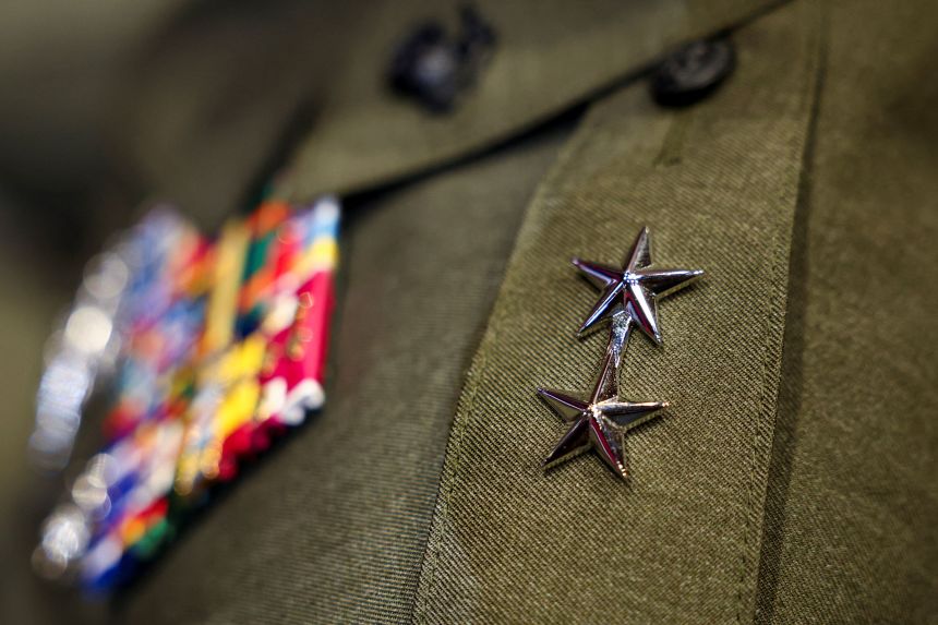 A senior military officer wears two stars on the shoulder of their uniform during a meeting convened by Defense Secretary Pete Hegseth at Marine Corps Base Quantico on September 30, 2025.