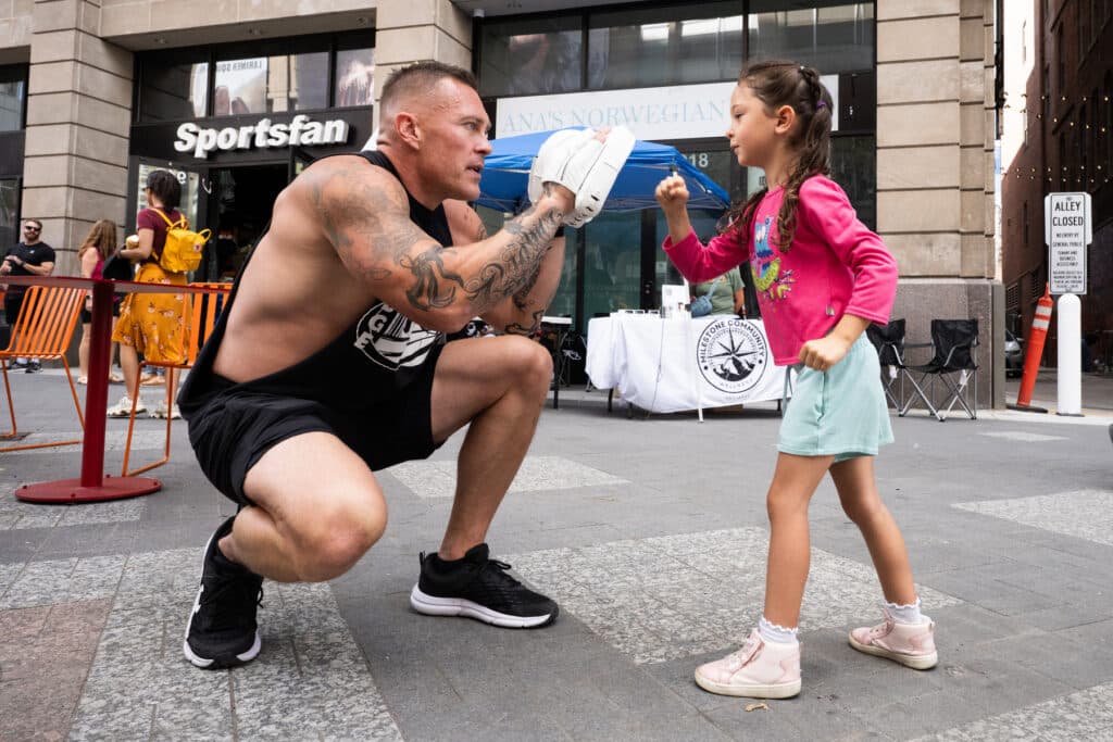 Dan Hugill does a little sparring with 5-year-old Eliena Mac
