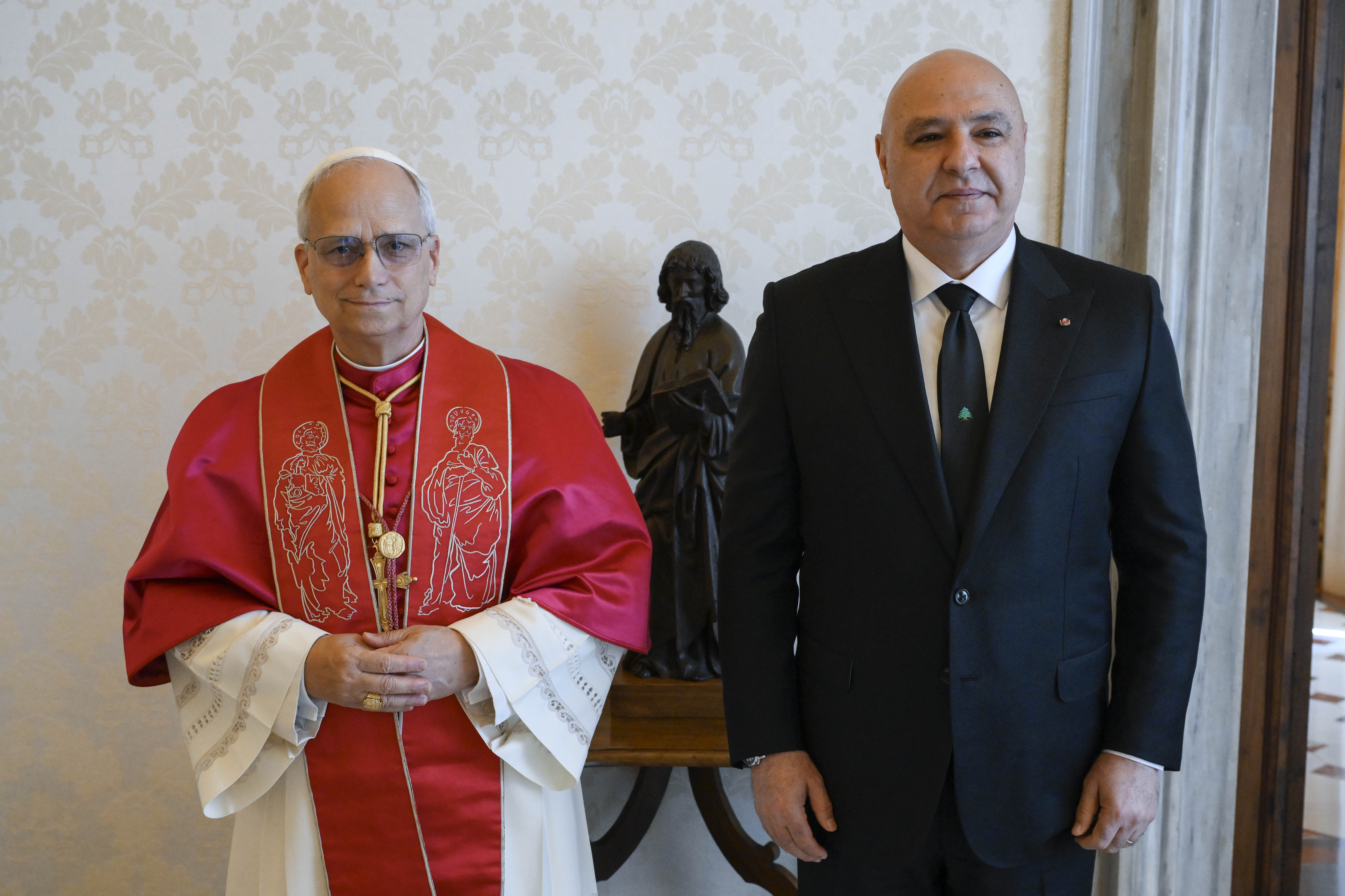Pope Leo XIV speaks with Lebanese President Joseph Aoun and his wife, Nehmat, in the library of the Apostolic Palace at the Vatican June 13, 2025. (CNS photo/Vatican Media)