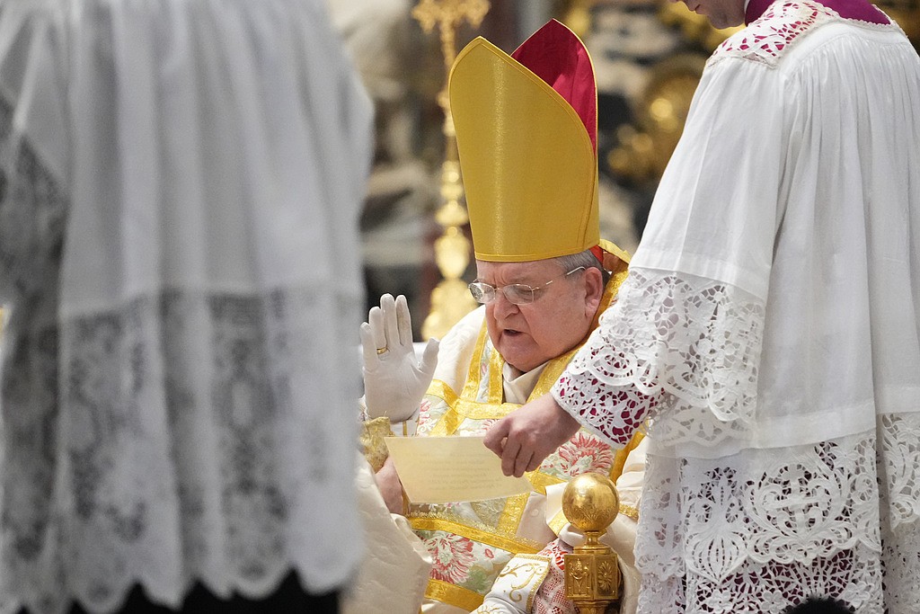 American cardinal celebrates old Latin Mass in St. Peter's in a sign of change