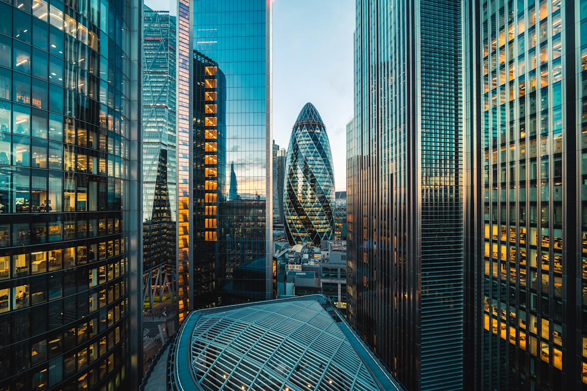Wall Street rises as traders shrug off US-China trade fears and FTSE slips on weak UK growth