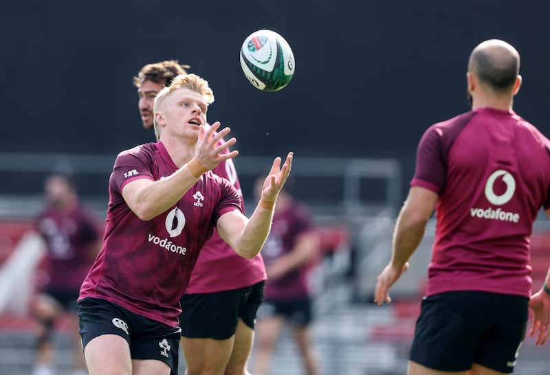 Tommy O'Brien keeps his eye on the ball during Ireland training ahead of Saturday evening's match against New Zealand at Soldier Field in Chicago. Photograph: Dan Sheridan/Inpho