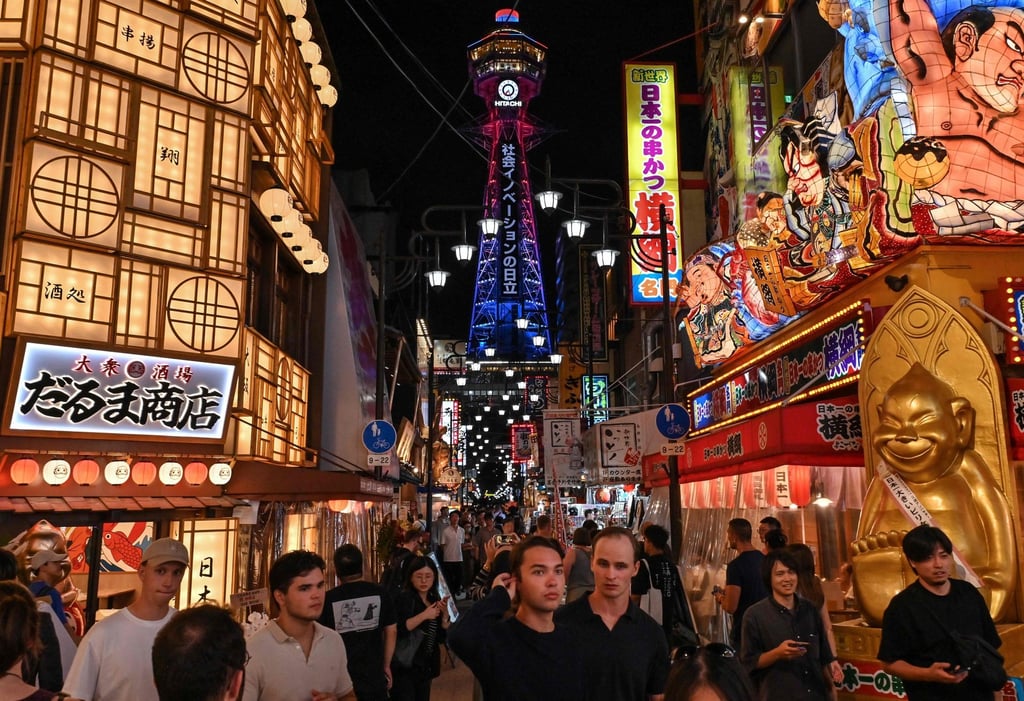 The popular Shinsekai area in Osaka’s Naniwa ward is crowded with tourists on September 30. Photo: AFP The popular Shinsekai area in Osaka’s Naniwa ward is crowded with tourists on September 30. Photo: AFP
