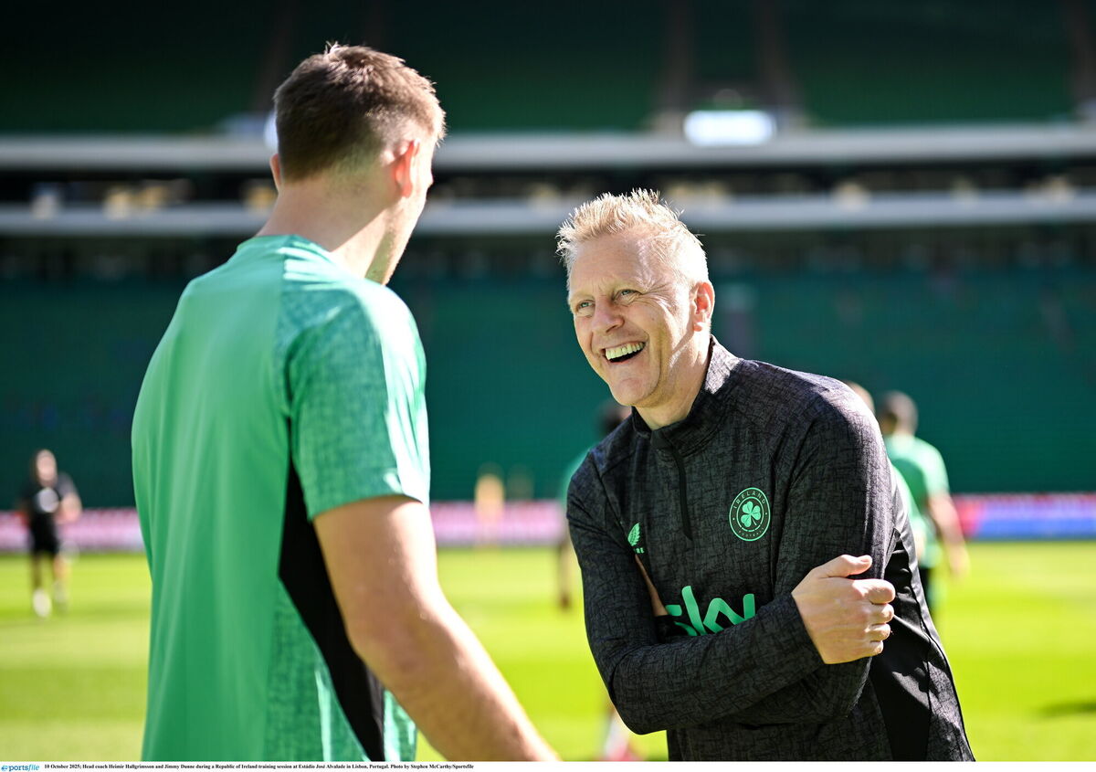 Head coach Heimir Hallgrimsson and Jimmy Dunne during a Republic of Ireland training session at Estádio José Alvalade. Pic: Stephen McCarthy/Sportsfile