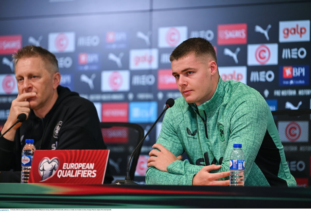 Evan Ferguson and head coach Heimir Hallgrimsson speak to media during a press conference at Estádio José Alvalade. Picture: Stephen McCarthy/Sportsfile