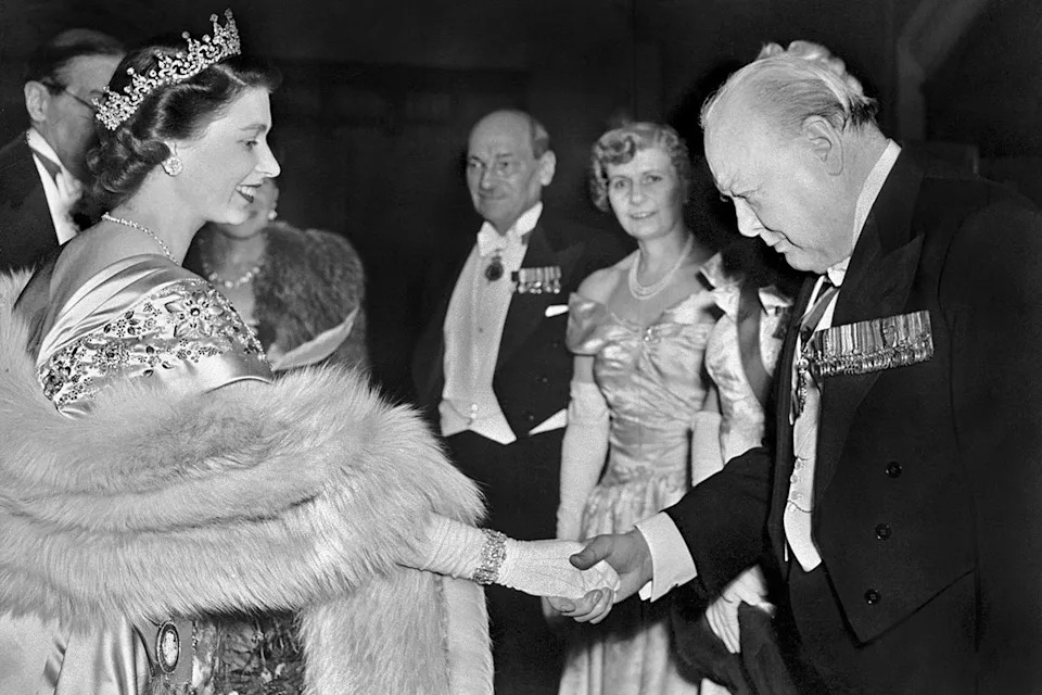 AFP via Getty Princess Elizabeth greeting Winston Churchill at a reception at the Guildhall in London in March 1950