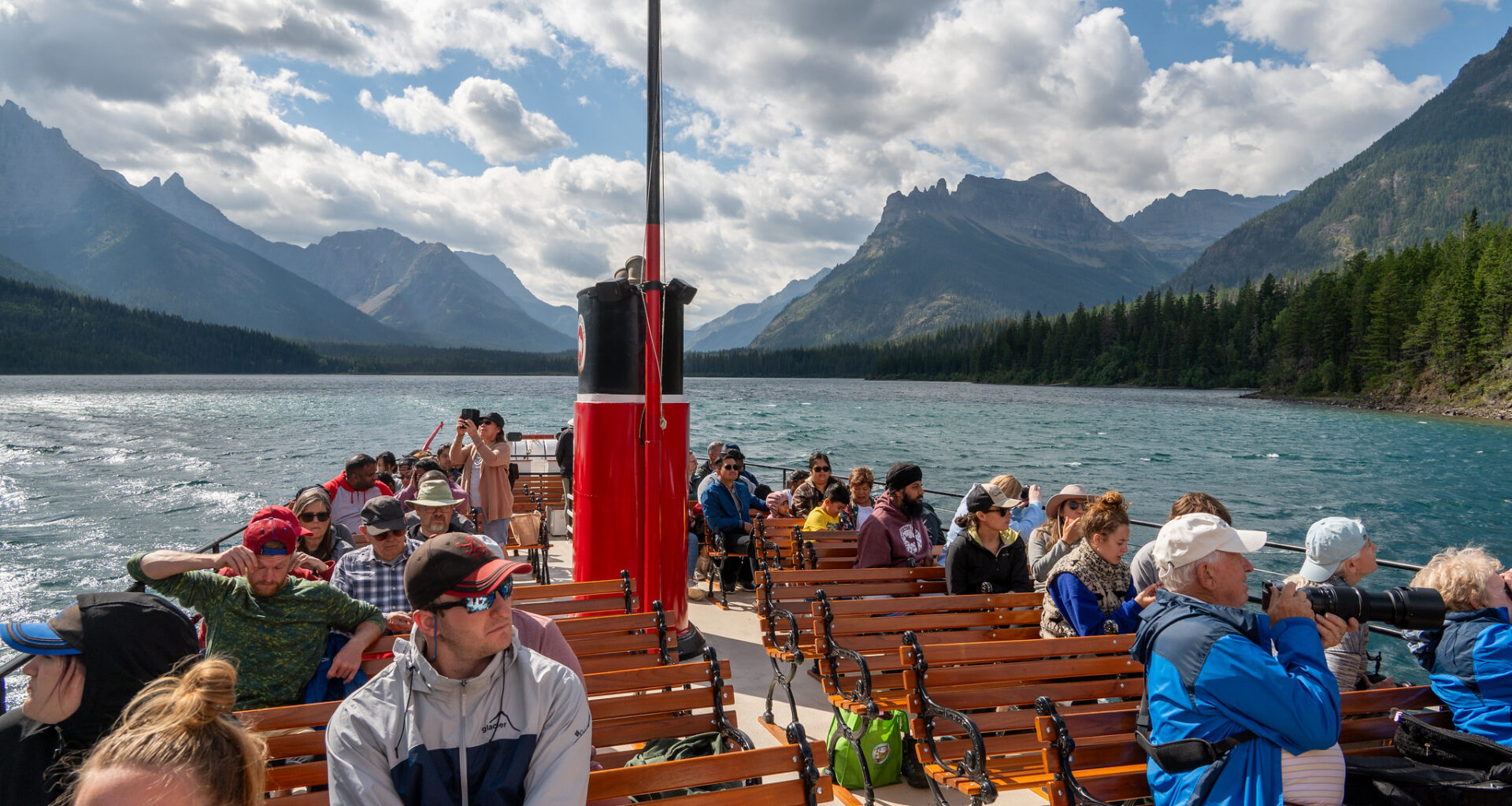 One of the boats that runs between Waterton Townsite and Goat Haunt is the International. Built in 1927, the International has carried thousands of visitors across the border during its lifetime. Passengers can disembark for a brief sightseeing opportunity, while others take the boat to start multi-day backpacking trips. (Photo by Glacier National Park / NPS)